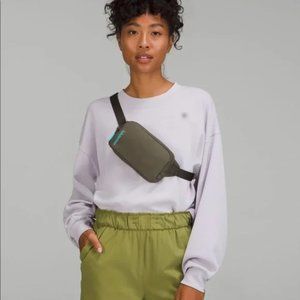 NEW with tags LULULEMON Mini Belt Bag Carob (greenish brown with teal Logo)
